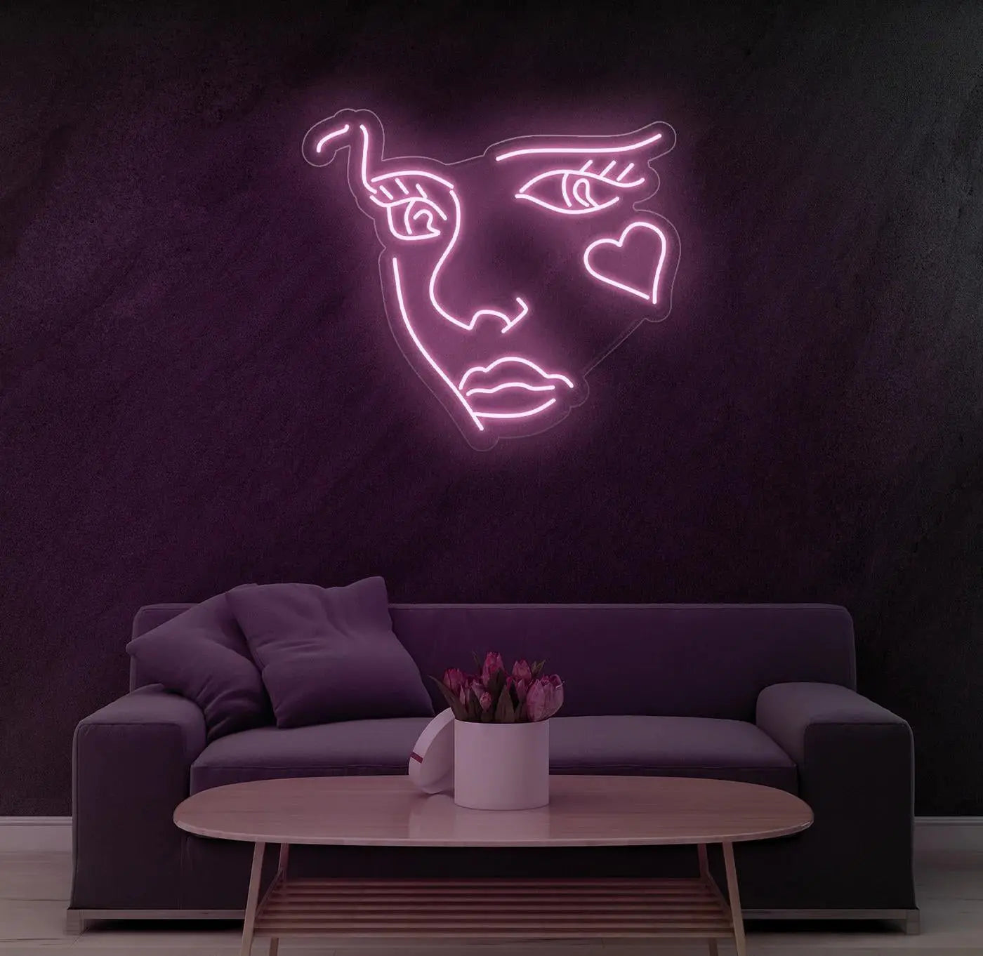 Néon LED visage abstrait rose doux offrant une lumière d’ambiance subtile dans une pièce contemporaine.