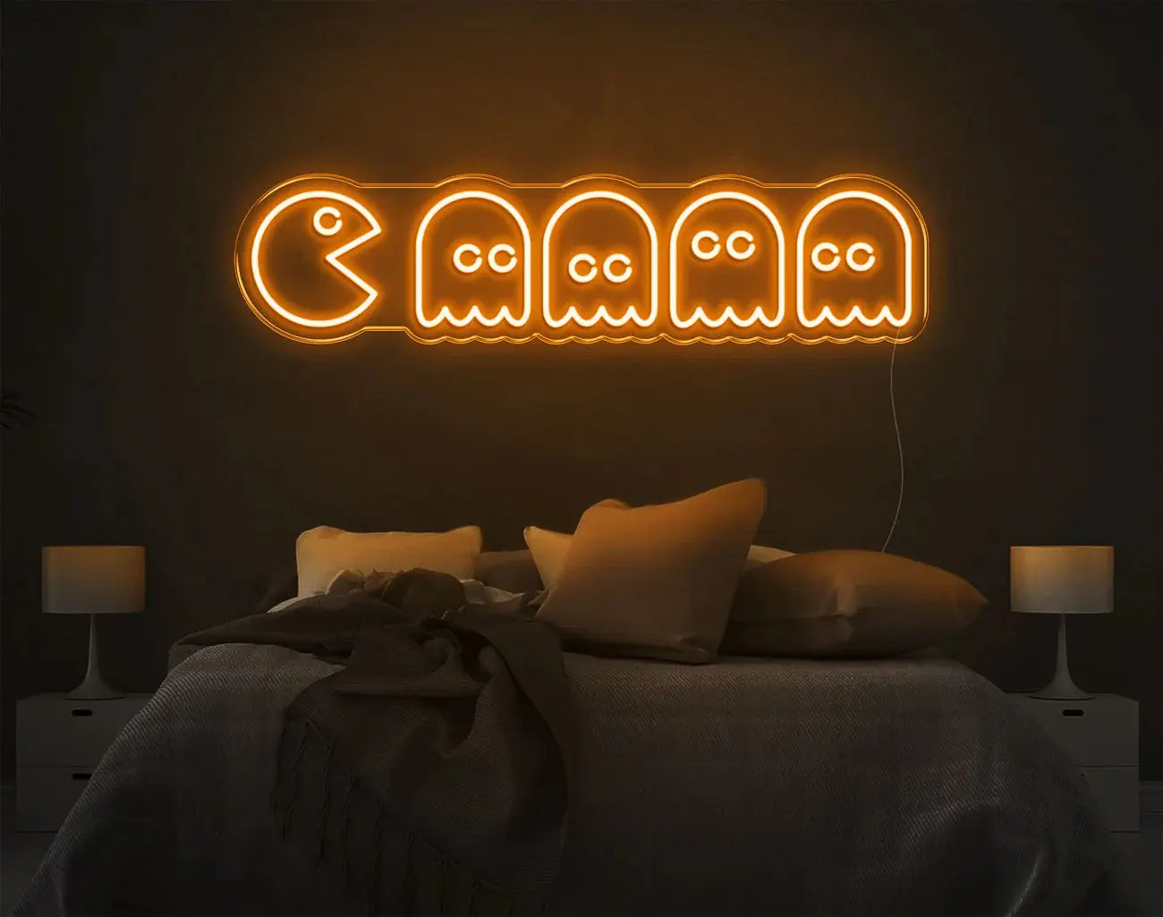 Lumière murale LED néon Pacman couleur ambre apportant une décoration rétro chaleureuse.